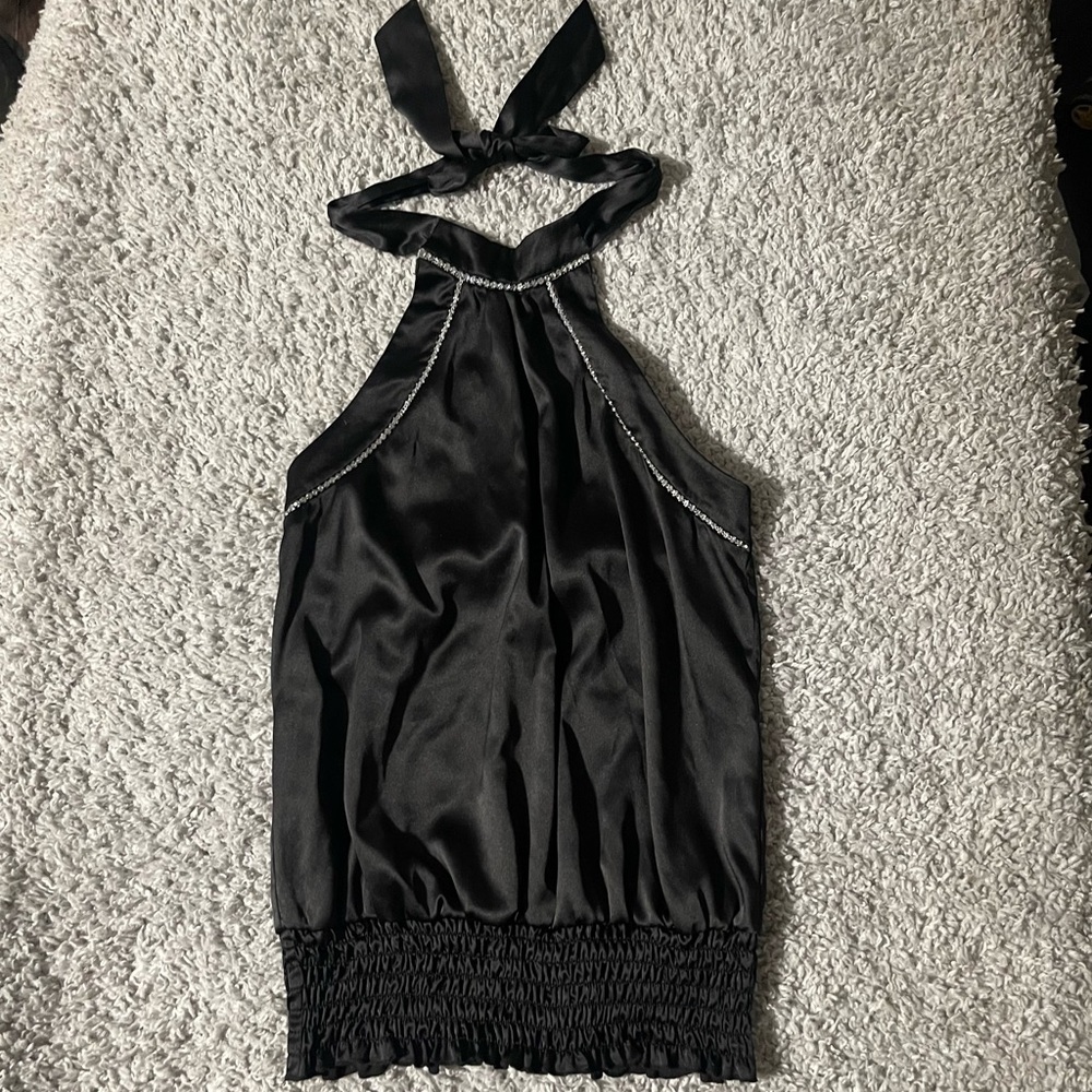 Y2K black silk backless top with rhinestone accents.